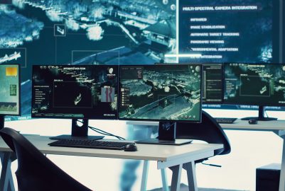 Empty military secret service headquarters used to follow threats Empty military secret service headquarters used to follow threats or national safety alerts, high tech equipment for a federal agency. Army command center with a big screen, telecommunications.